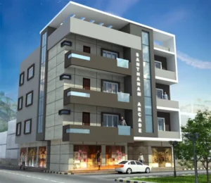 A modern four-story building named "Santhanam Arcade" featuring balconies, large glass windows, and shops on the ground floor. The building has a contemporary design, with a car parked at the entrance and a clear blue sky in the background.