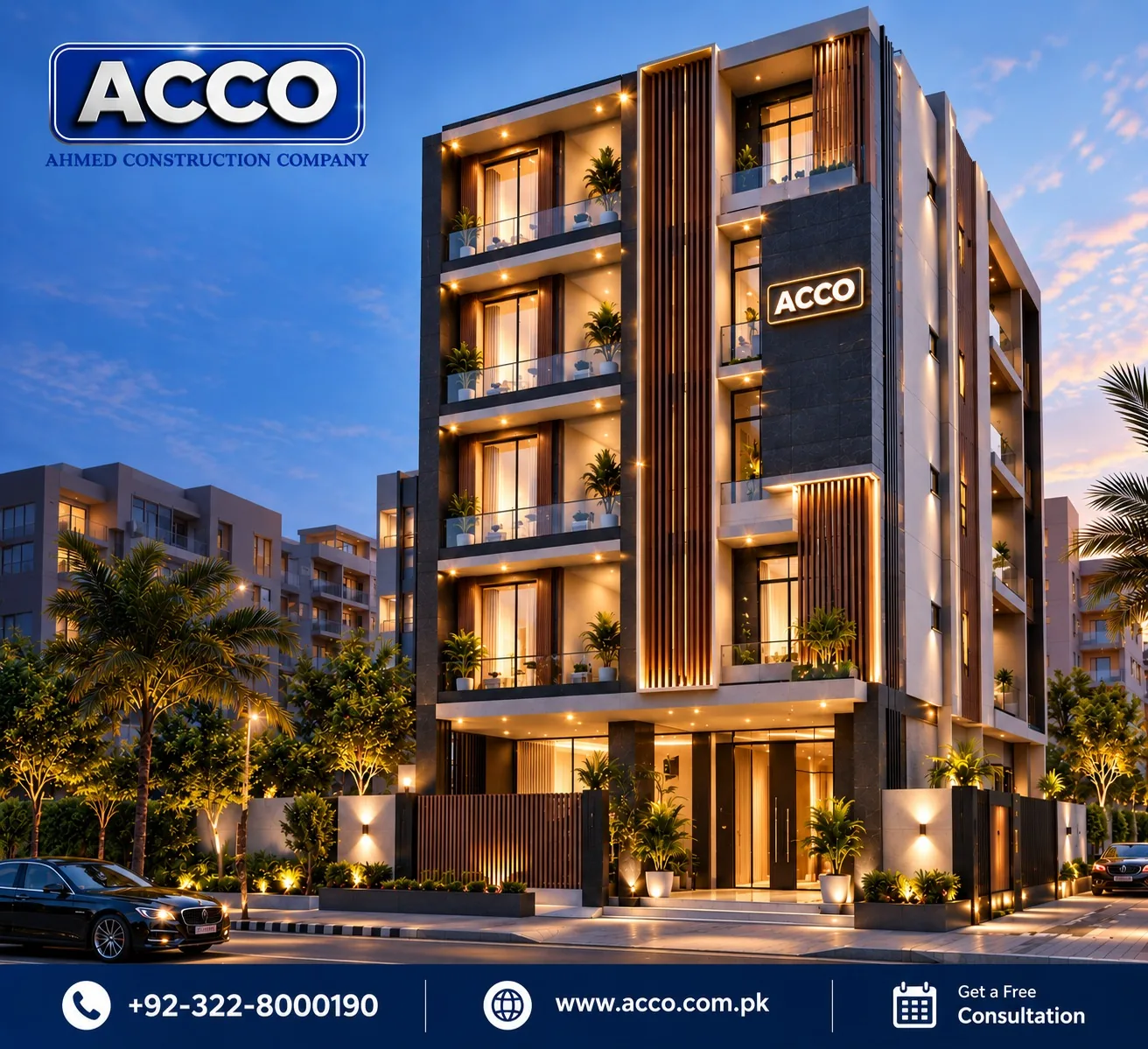 Multi-storey building with vertical wooden fins, dark stone cladding, lit glass balconies and ACCO signage at dusk