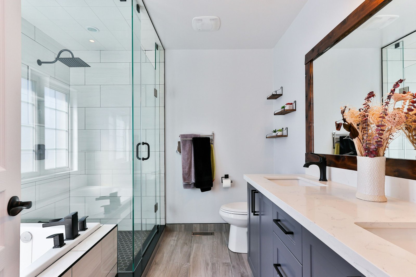 Bathroom renovation with glass shower and vanity