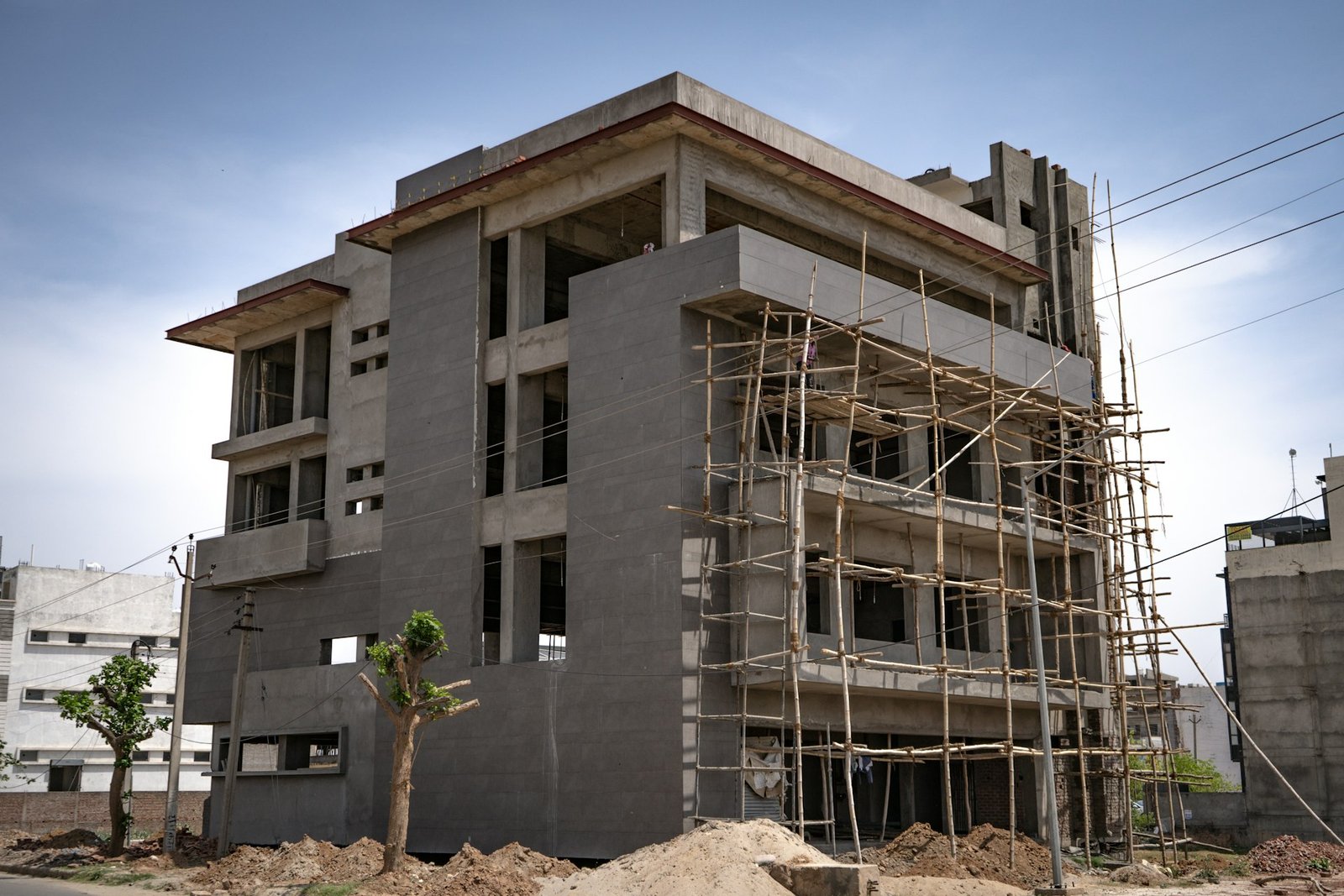 Grey structure house construction in Lahore by ACCO