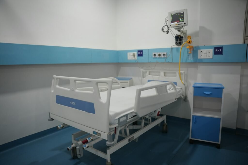 Hospital ward and patient room with medical gas bedhead panel