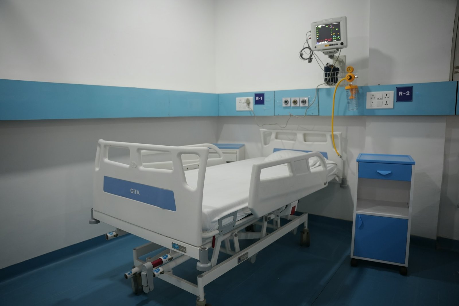 Hospital ward and patient room with medical gas bedhead panel