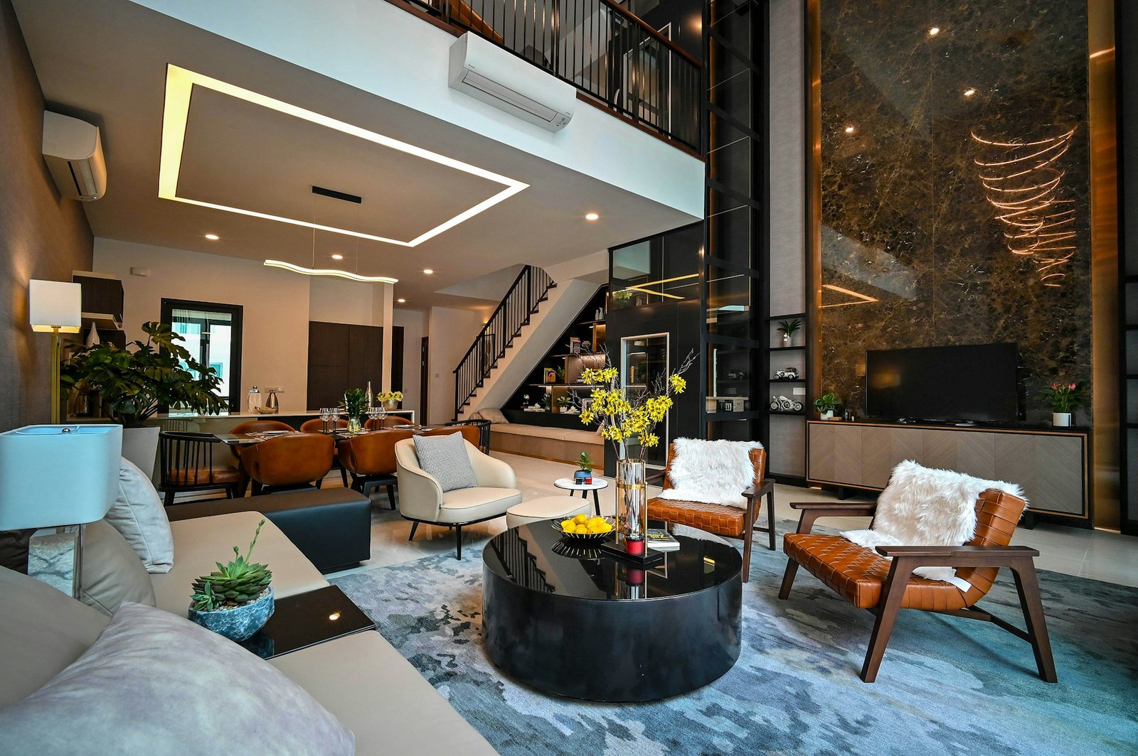 Luxury home interior design in Lahore with false ceiling, lighting and lounge seating