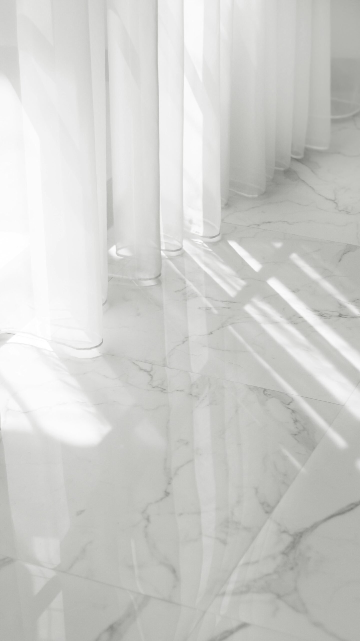 Polished marble floor installation in a house