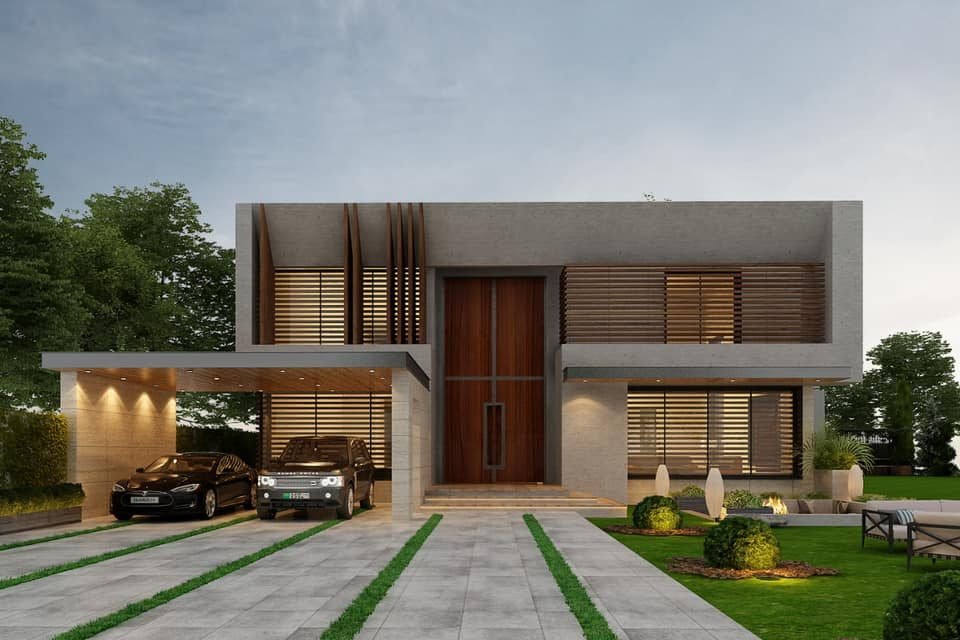 Modern 1 kanal house design with wooden main door and paved driveway in DHA Lahore