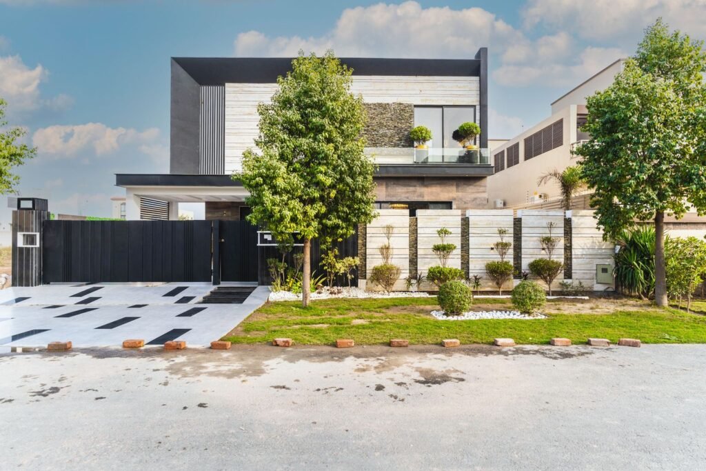 Modern double-storey house with landscaped lawn in Lahore, Pakistan