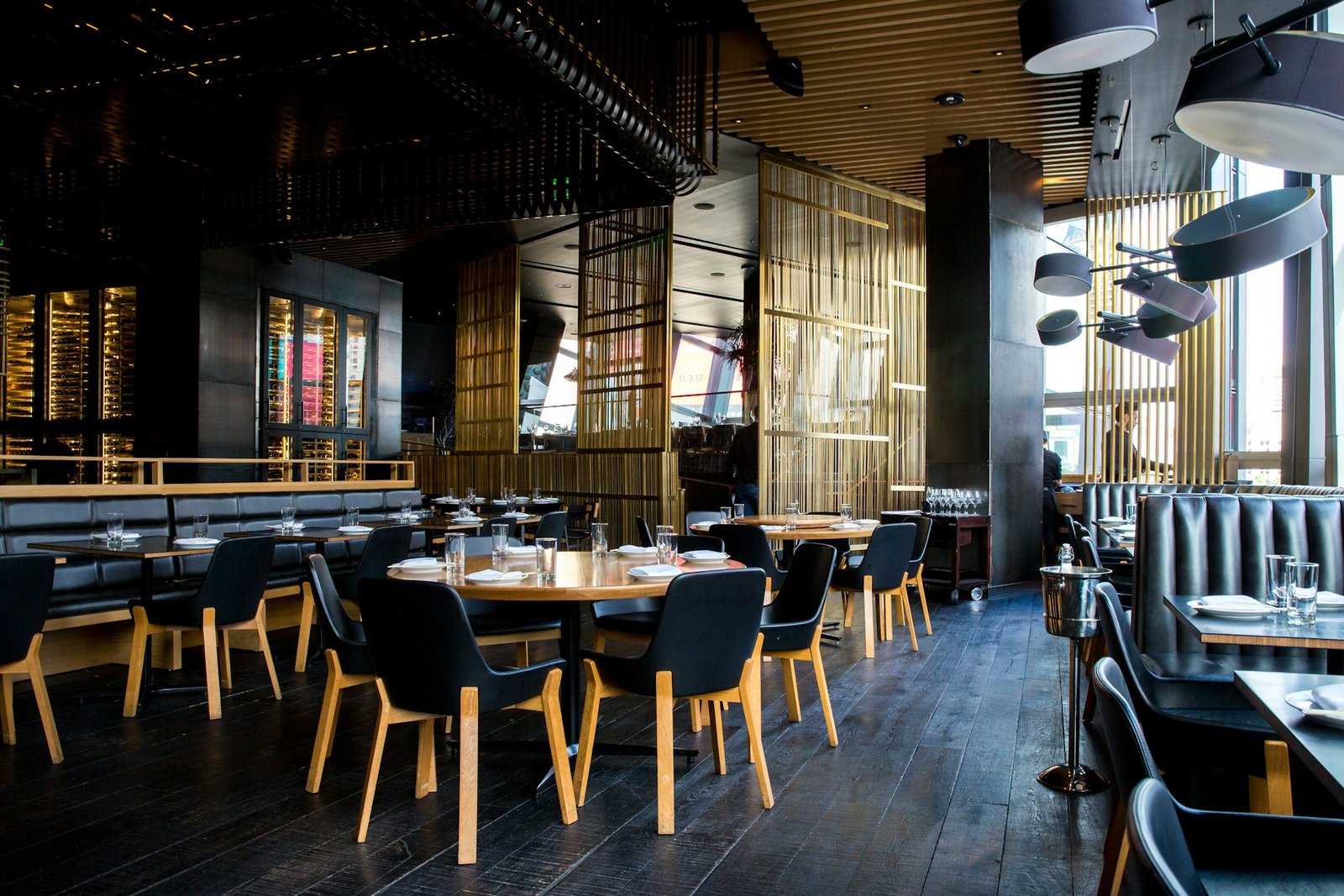 Restaurant interior design with dining tables and pendant lighting